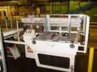 Used SWF Mcdowell 201LH case erector and bottom sealer capable of speeds up to 30 cases per minute. Has Nordson 3400 glue system and a case size range: length 7