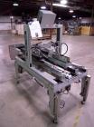 Used Belcor 505 semi-automatic case erector with integrated Belcor 252 automatic top and bottom case taper sealer. Speeds up to 15 cpm. Erector size range: length 8