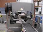 Used Pearson Box Erector, Model R350G.Features Allen Bradley Micrologix 1500 PLC, (5) Allen Bradley Series C VFDs, Allen Bradley Panelview 300 operator interface, Nordson Problue Model 10 hot melt gl...