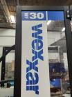 Used Wexxar Automatic Case Erector Sealer, Model WF-30. Machine is capable of speeds up to 30 cases per minute (depending on case size). Pin and dome-style opening. Nordson hot melt glue unit. Has a ...