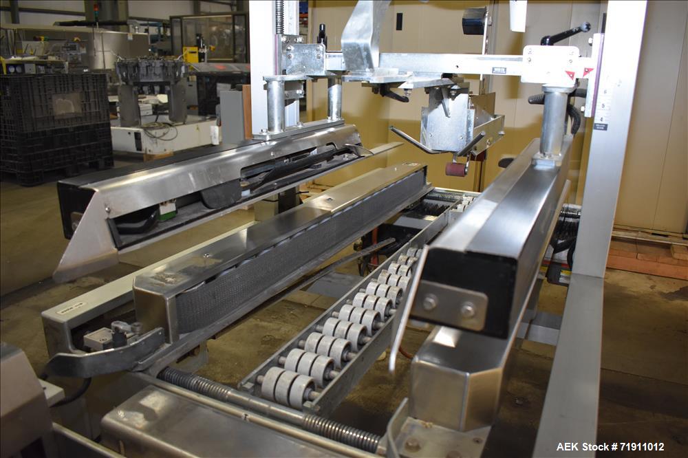 Used Belcor 505 semi-automatic case erector with integrated Belcor 252 automatic top and bottom case taper sealer. Speeds up to 15 cpm. Erector size range: length 8" to 26.5", width 6" to 16", height...
