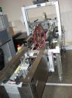 Used Belcor 505 semi automatic case erector with integrated Belcor 252 automatic top and bottom case taper sealer. Speeds up to 15 cpm. Erector size range: length 8