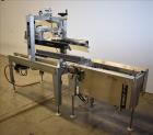 Used-Belcor 505 semi-automatic case erector with integrated Belcor 252 automatic top and bottom case taper sealer. Speeds up...