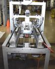 Used Belcor 505 semi-automatic case erector with integrated Belcor 252 automatic top and bottom case taper sealer. Speeds up to 15 cpm. Erector size range: length 8