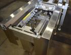 Used-Belcor 505 semi-automatic case erector with integrated Belcor 252 automatic top and bottom case taper sealer. Speeds up...