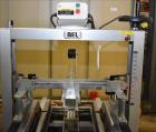 Used Belcor 505 semi-automatic case erector with integrated Belcor 252 automatic top and bottom case taper sealer. Speeds up to 15 cpm. Erector size range: length 8