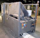 Used Wepackit Model 310E Mid-Speed Case Erector. Capable of up to 15 cases per minute. Approximate case size range:length 6’’ to 24’’, width 5.5’’ to 18