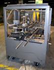 Used Wepackit Model 310E Mid-Speed Case Erector. Capable of up to 15 cases per minute. Approximate case size range:length 6’’ to 24’’, width 5.5’’ to 18