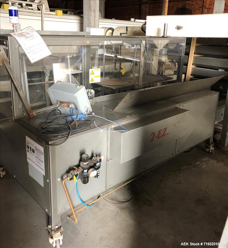 Used Combi Model 2EZ Case Erector Sealer.