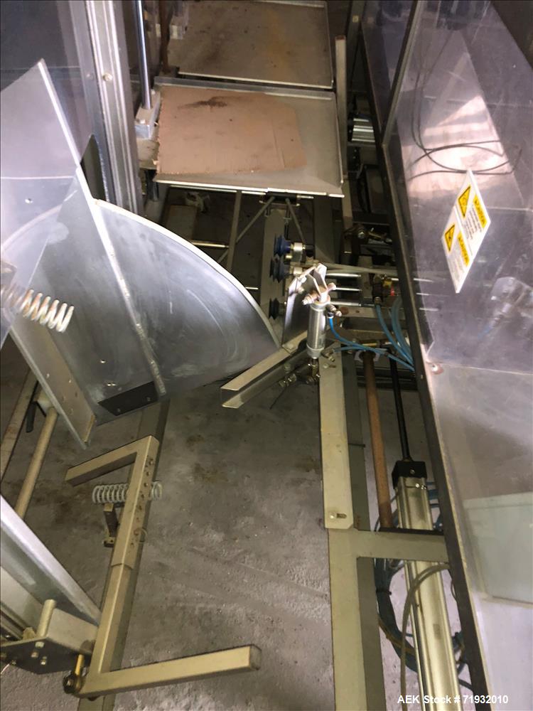 Used Combi Model 2EZ Case Erector Sealer.