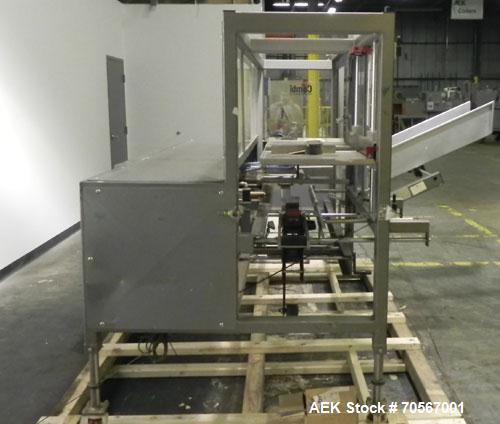 Used Combi Model 2-EZ Plus Case Erector and Bottom Taper. Capable of speeds up to 12 cases per minute. Case size range: length 6" to 24", width 4 1/2" to 16", depth 4 1/2" to 18". Has right angle cas...