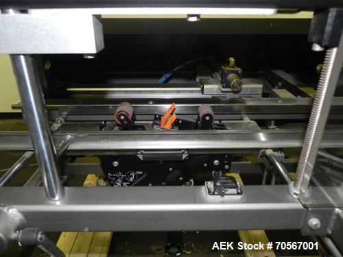 Used Combi Model 2-EZ Plus Case Erector and Bottom Taper. Capable of speeds up to 12 cases per minute. Case size range: length 6" to 24", width 4 1/2" to 16", depth 4 1/2" to 18". Has right angle cas...