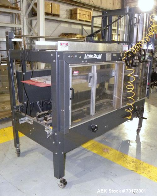 Used Little David (Loveshaw) CF20T Case Erector and Bottom Taper. Capable of speeds to 4 cases per minute. Small footprint design with a case size range: length 6" -16", width 6" - 12", height 4" -12...