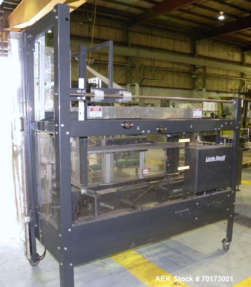 Used Little David (Loveshaw) CF20T Case Erector and Bottom Taper. Capable of speeds to 4 cases per minute. Small footprint design with a case size range: length 6" -16", width 6" - 12", height 4" -12...