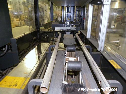 Used Little David (Loveshaw) CF20T Case Erector and Bottom Taper. Capable of speeds to 4 cases per minute. Small footprint design with a case size range: length 6" -16", width 6" - 12", height 4" -12...