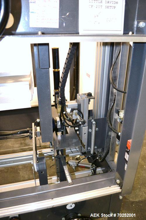Used Little David CF20T Case erector & Bottom Taper. Capable of 6 cases per minute. Case size range: (Length) 6"-16" (Width) 6"-12" (Height) 4"-12". Allen-Bradley PLC controls. Tape Specifications: A...
