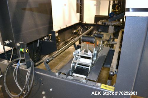 Used Little David CF20T Case erector & Bottom Taper. Capable of 6 cases per minute. Case size range: (Length) 6"-16" (Width) 6"-12" (Height) 4"-12". Allen-Bradley PLC controls. Tape Specifications: A...