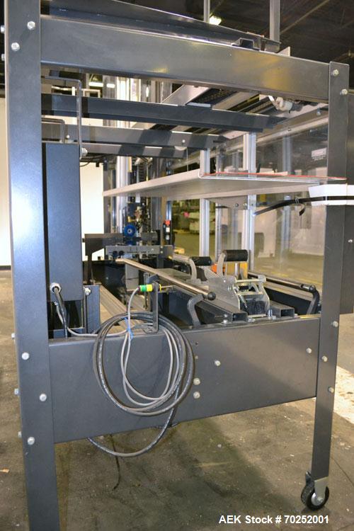 Used Little David CF20T Case erector & Bottom Taper. Capable of 6 cases per minute. Case size range: (Length) 6"-16" (Width) 6"-12" (Height) 4"-12". Allen-Bradley PLC controls. Tape Specifications: A...