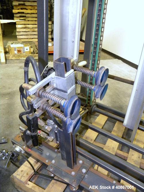 Used Loveshaw Little David Case Former, Model CF40T, Carbon Steel. Approximately 20 cases per minute. Case size range: length 7" to 24", width 6" to 16", height 4" to 16". Chain and lug drive, 1/2 hp...