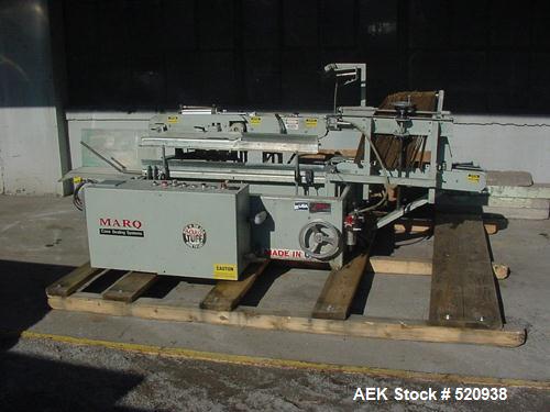 Used Marq model 2000 case erector with bottom taper for sealer forRSC cases. Unit has a size range of 6-14" wide x 6-16" long x 4-14"high at up to 8 cases per minute. Includes Allen Bradley controls,...