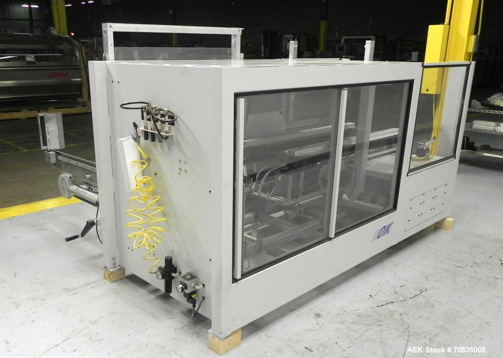 Used OK International Model Duraformer 2 Automatic Case Erector and Bottom Taper. Machine is capable of speeds up to 18 cases per minute. Case size range: (Length) 7" - 20" (Width) 6" - 16" (Height) ...