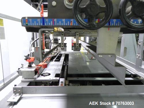 Used Hartness (SWF/McDowell) Model 201LH Automatic Case Erector Bottom Sealer. Capable of speeds up to 30 cases per minute. Has a case size range: (Length) 5-3/4" - 24" (Width) 5-3/4" - 24" (Depth) 1...