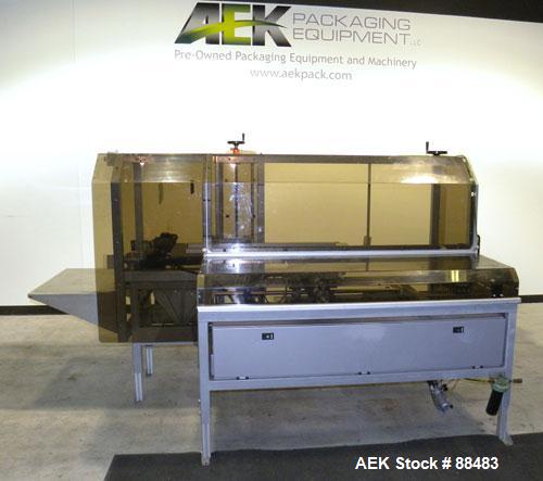 Used Soco Case Erector, Model BE-300-ABS2. Capable of speeds up to 8 cpm. Has bottom tape sealer. Case size range: length 300 to 620 mm, width 200 to 400 mm, depth 130 to 500 mm. Includes an Allen Br...