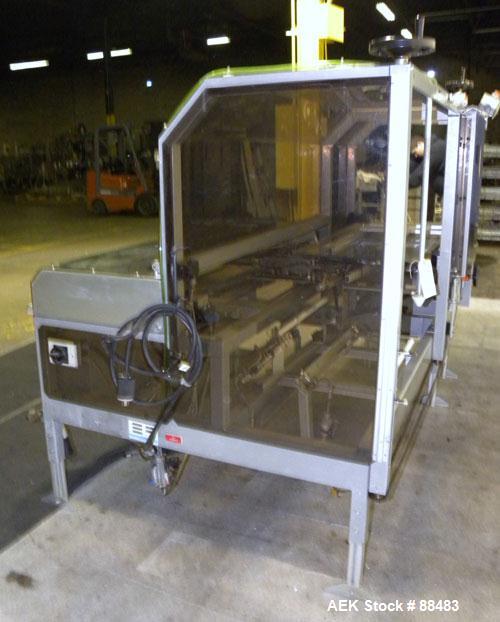 Used Soco Case Erector, Model BE-300-ABS2. Capable of speeds up to 8 cpm. Has bottom tape sealer. Case size range: length 300 to 620 mm, width 200 to 400 mm, depth 130 to 500 mm. Includes an Allen Br...