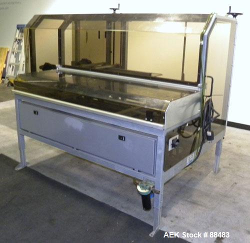 Used Soco Case Erector, Model BE-300-ABS2. Capable of speeds up to 8 cpm. Has bottom tape sealer. Case size range: length 300 to 620 mm, width 200 to 400 mm, depth 130 to 500 mm. Includes an Allen Br...