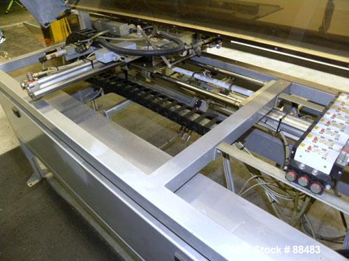 Used Soco Case Erector, Model BE-300-ABS2. Capable of speeds up to 8 cpm. Has bottom tape sealer. Case size range: length 300 to 620 mm, width 200 to 400 mm, depth 130 to 500 mm. Includes an Allen Br...