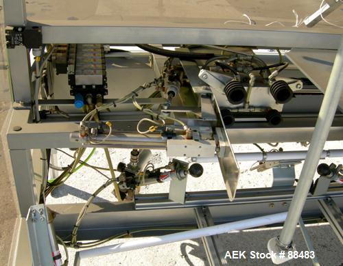 Used Soco Case Erector, Model BE-300-ABS2. Capable of speeds up to 8 cpm. Has bottom tape sealer. Case size range: length 300 to 620 mm, width 200 to 400 mm, depth 130 to 500 mm. Includes an Allen Br...