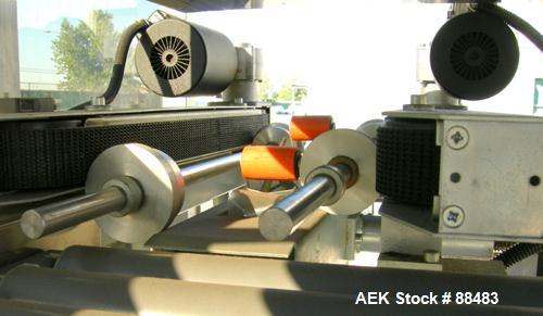 Used Soco Case Erector, Model BE-300-ABS2. Capable of speeds up to 8 cpm. Has bottom tape sealer. Case size range: length 300 to 620 mm, width 200 to 400 mm, depth 130 to 500 mm. Includes an Allen Br...