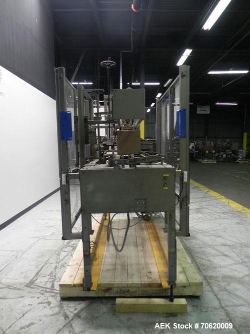 Used Wepackit Model MPE300 Case Erector Bottom Tape Sealer. Machine is capable of speeds up to 20 cases per minute. Knockdown case size range: 16" to 34" (length). Case size range 6" - 22" (length), ...