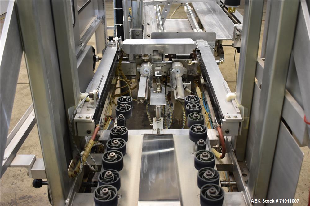 Used Wexxar Model ABF-T Automatic Case Erector and Bottom Tape Sealer.