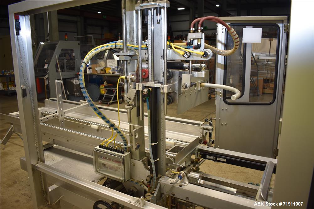 Used Wexxar Model ABF-T Automatic Case Erector and Bottom Tape Sealer.