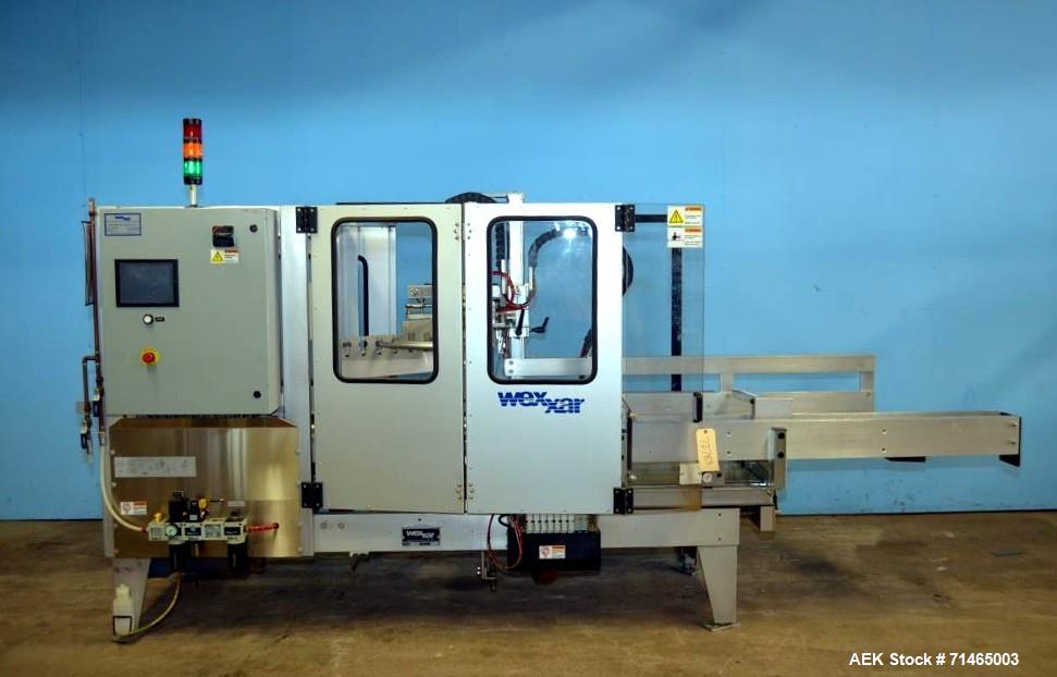 Used Wexxar Model WF-2TR Automatic Case Erector and Bottom Taper.  Case former is capable of speeds up to 30 cases per minute.  Case size range: Length 7" - 24", Width 5" - 17", Height 5" - 16".  Has...