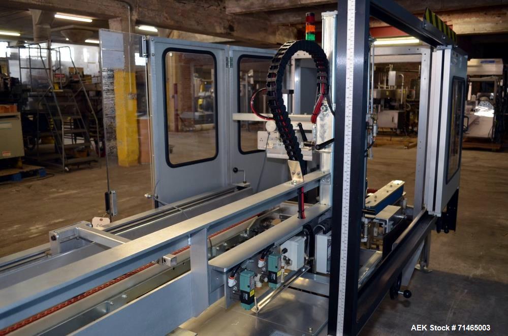 Used Wexxar Model WF-2TR Automatic Case Erector and Bottom Taper.  Case former is capable of speeds up to 30 cases per minute.  Case size range: Length 7" - 24", Width 5" - 17", Height 5" - 16".  Has...