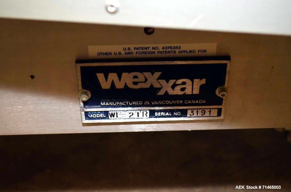 Used Wexxar Model WF-2TR Automatic Case Erector and Bottom Taper.  Case former is capable of speeds up to 30 cases per minute.  Case size range: Length 7" - 24", Width 5" - 17", Height 5" - 16".  Has...