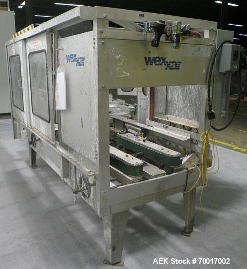 Used Wexxar WFT Automatic Case Former / Erector With Tape Head Bottom Sealer, Model WFT. Capable of speeds up to 25 cpm. Case Size Range: Length- 7" to 22", Width- 6" to 17", Height- 6" to 20". Has c...