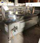 Used- Combi Model 2EZ Case Erector Sealer.