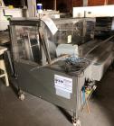 Used Combi Model 2EZ Case Erector Sealer.