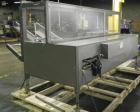 Used Combi Model 2-EZ Plus Case Erector and Bottom Taper. Capable of speeds up to 12 cases per minute. Case size range: length 6