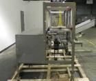 Used Combi Model 2-EZ Plus Case Erector and Bottom Taper. Capable of speeds up to 12 cases per minute. Case size range: length 6
