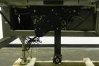 Used Combi Model 2-EZ Plus Case Erector and Bottom Taper. Capable of speeds up to 12 cases per minute. Case size range: length 6