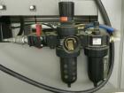Used Combi Model 2-EZ Plus Case Erector and Bottom Taper. Capable of speeds up to 12 cases per minute. Case size range: length 6