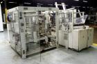 Used Focke Model 486 Automatic Case Erector, Side Load Packer, and Tape Sealer