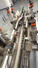 Used Focke Model 486 Automatic Case Erector, Side Load Packer, and Tape Sealer