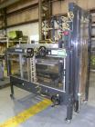 Used Little David (Loveshaw) CF20T Case Erector and Bottom Taper. Capable of speeds to 4 cases per minute. Small footprint design with a case size range: length 6