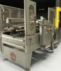 Used Marq Model HPE-RH NS Case Erector Bottom Sealer. Capable of speeds from 30 to 40 cases per minute. Is set up to tape boxes closed (with a side seal). Has a formed case size range: Length 10