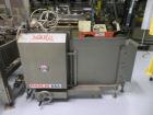 Used Marq Model HPE-RH NS Case Erector Bottom Sealer. Capable of speeds from 30 to 40 cases per minute. Is set up to tape boxes closed (with a side seal). Has a formed case size range: Length 10